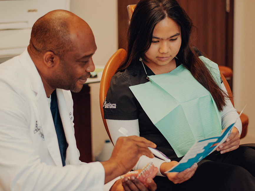 Dental explaining procedure to patient